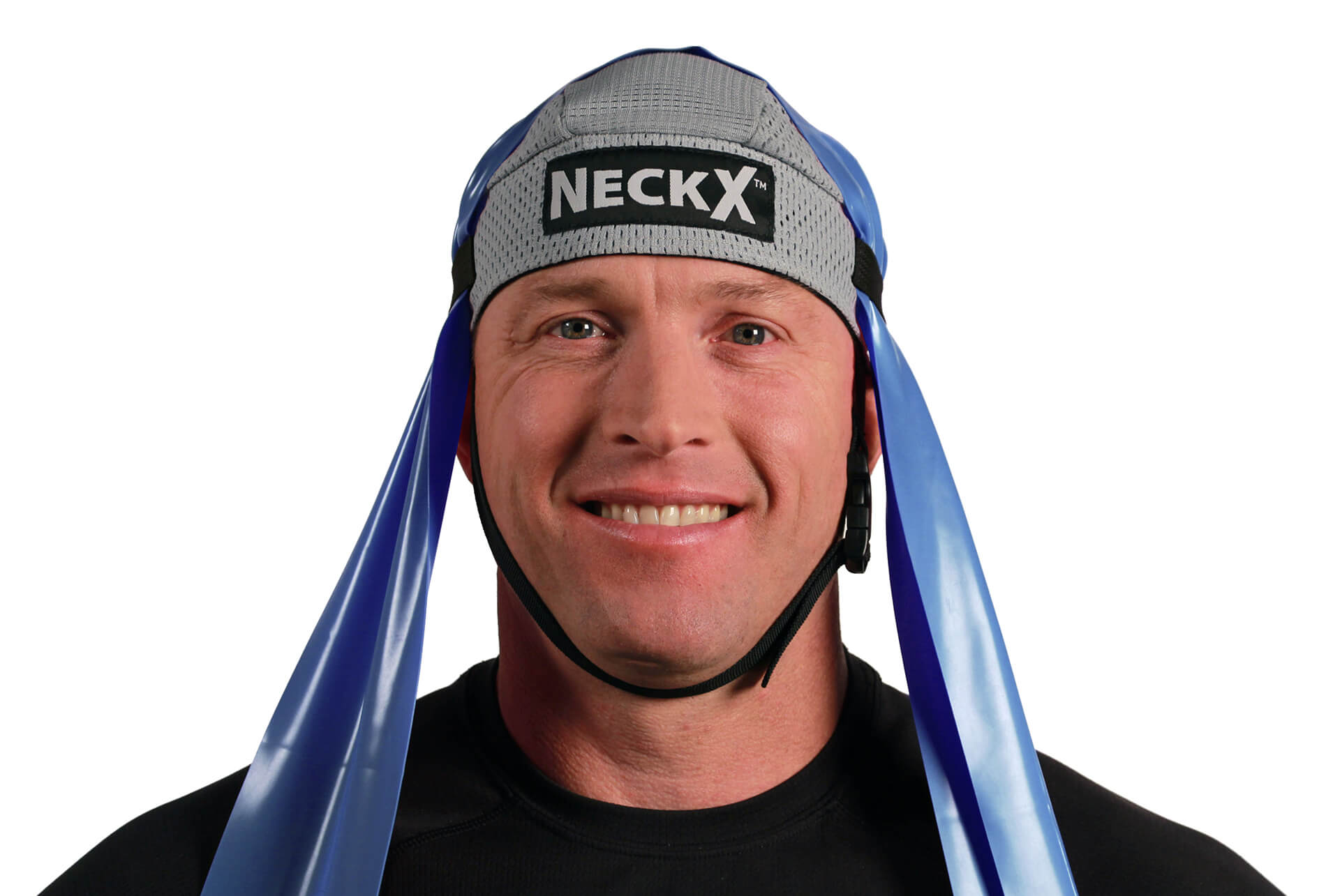 A man wearing a blue hat with the word NECK X® TRAINING SYSTEM on it.